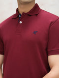 Maroon polo shirt